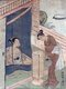 Japan: A young woman breast feeding an infant behind mosquito netting, with a female servant standing next to a lantern outside. Suzuki Harunobu (1724-1770)